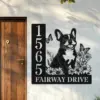 French-Bulldog-Sitting-with-Butterfly-1 Black metal house sign on exterior wall next to wooden door showing address 1565 and text FAIRWAY DRIVE with a happy French bulldog, flowers and butterflies