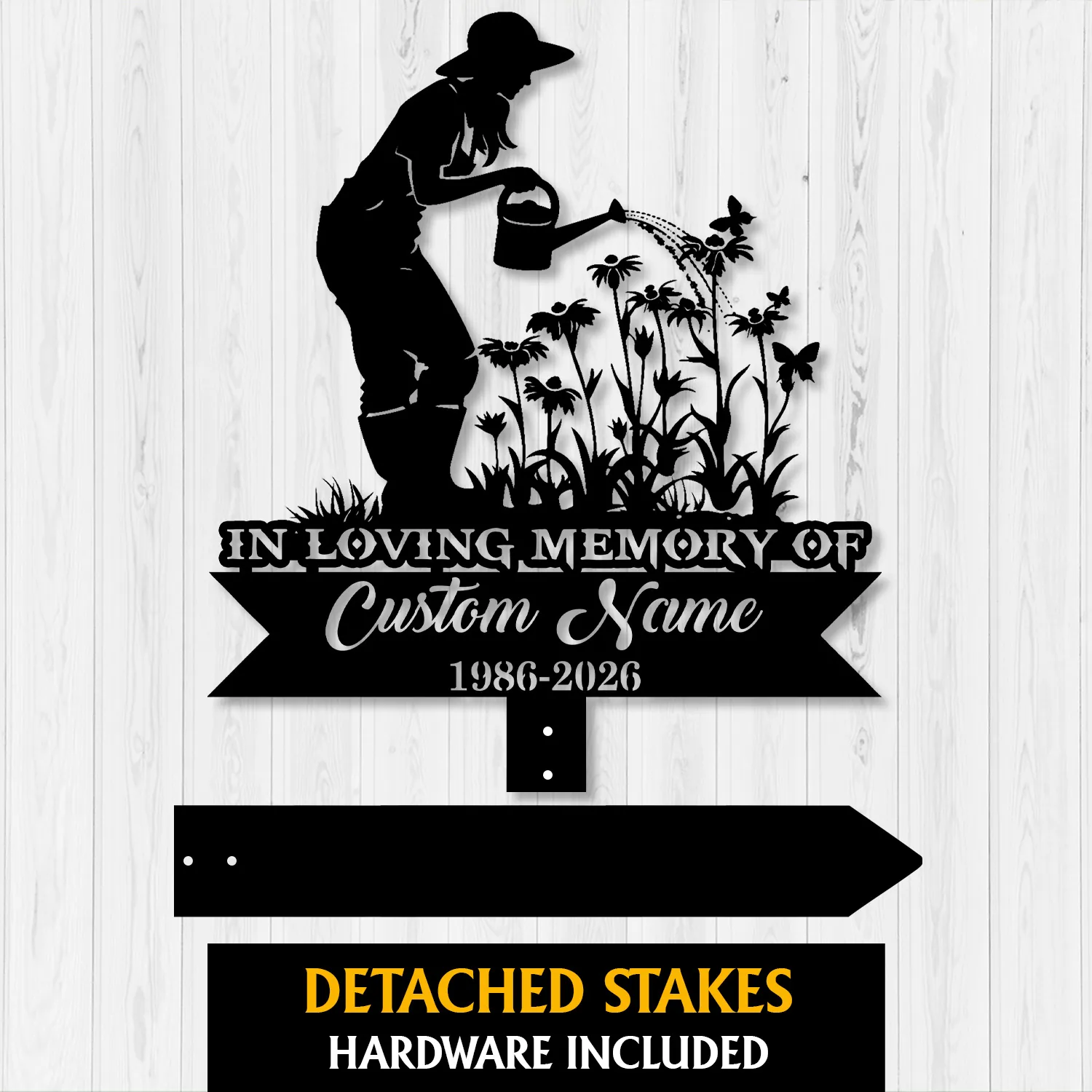 Black metal memorial garden stake silhouette of a woman watering flowers with text panels reading "In Loving Memory of Custom Name 1986-2026" on a light wood background