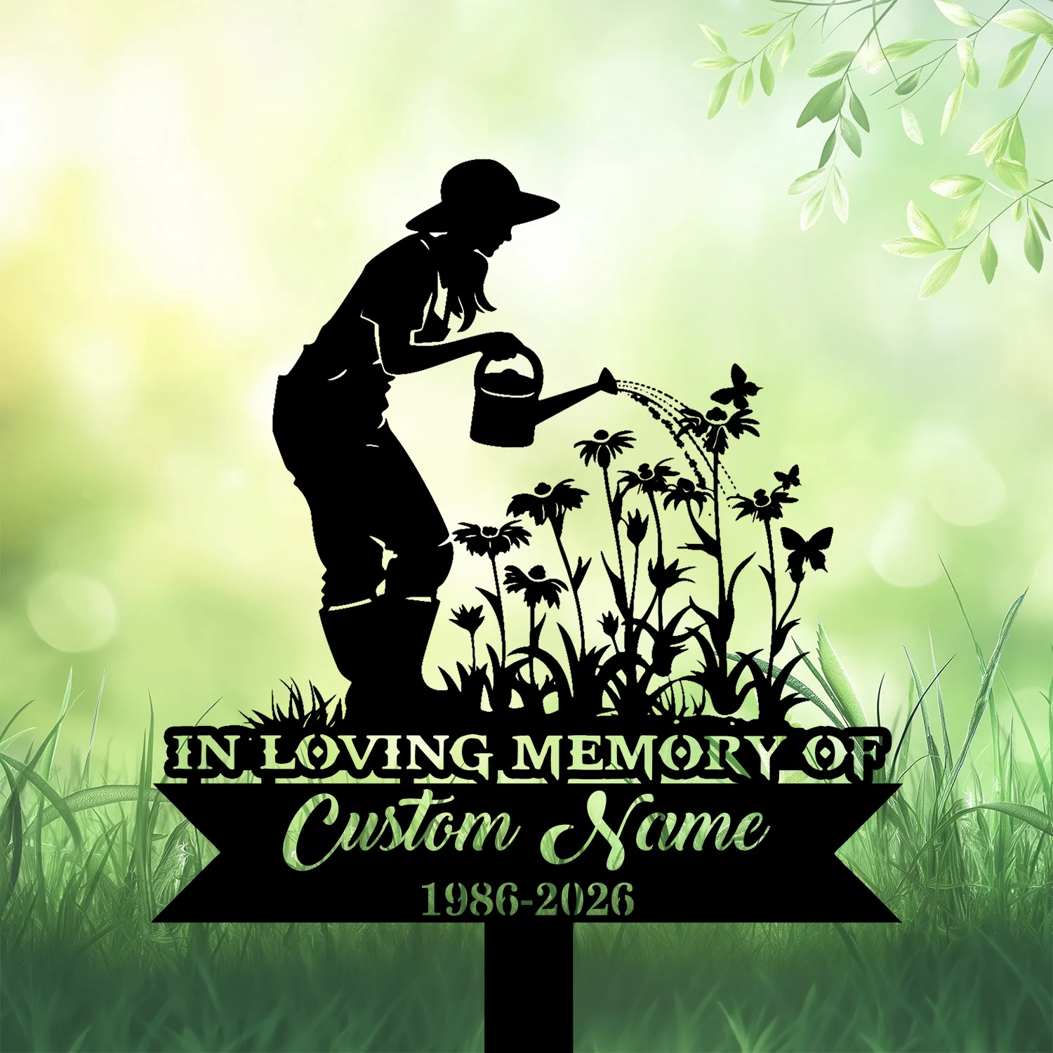 Silhouette memorial garden sign of a woman watering flowers with text reading "In Loving Memory of Custom Name 1986-2026" against a soft green leafy background