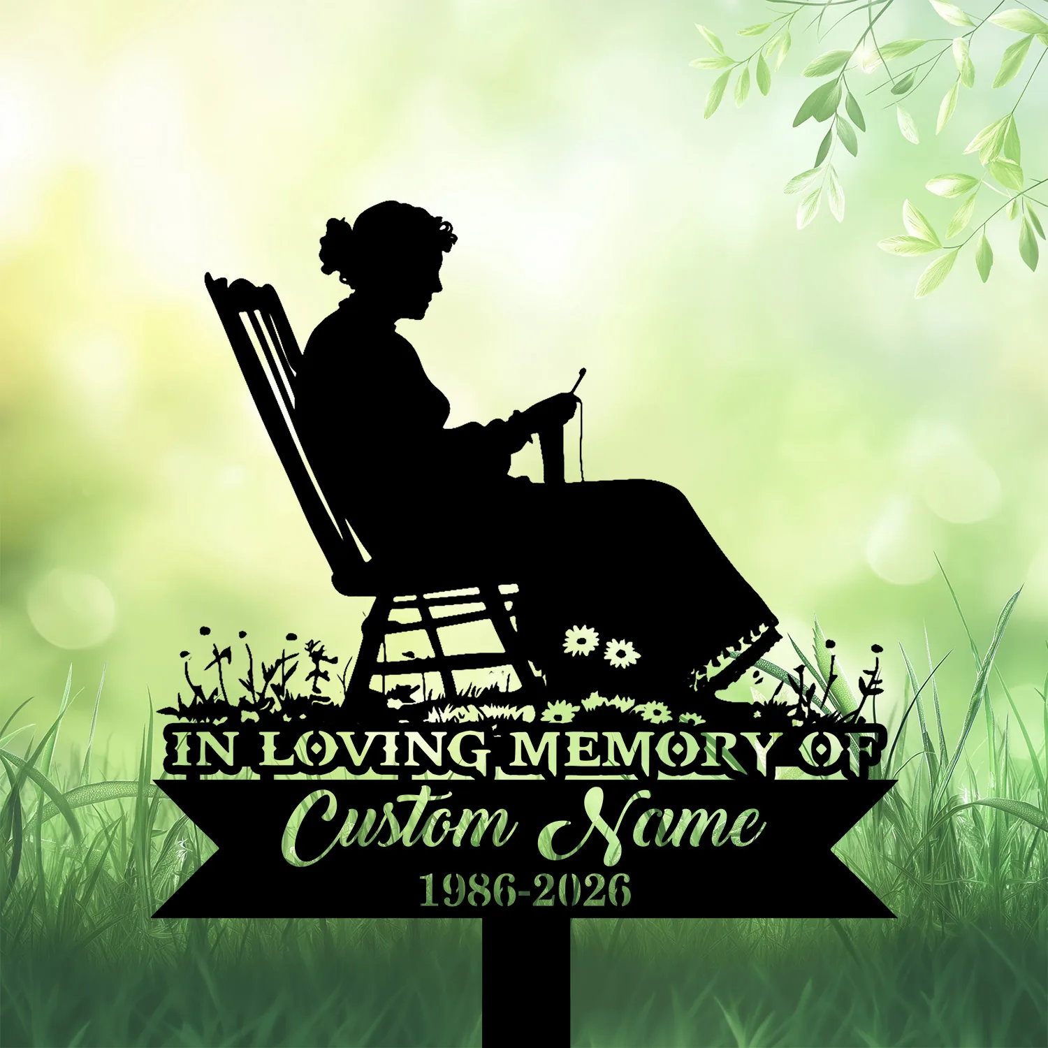 Black memorial garden stake with woman knitting in rocking chair, text 'In Loving Memory of Custom Name 1986-2026'