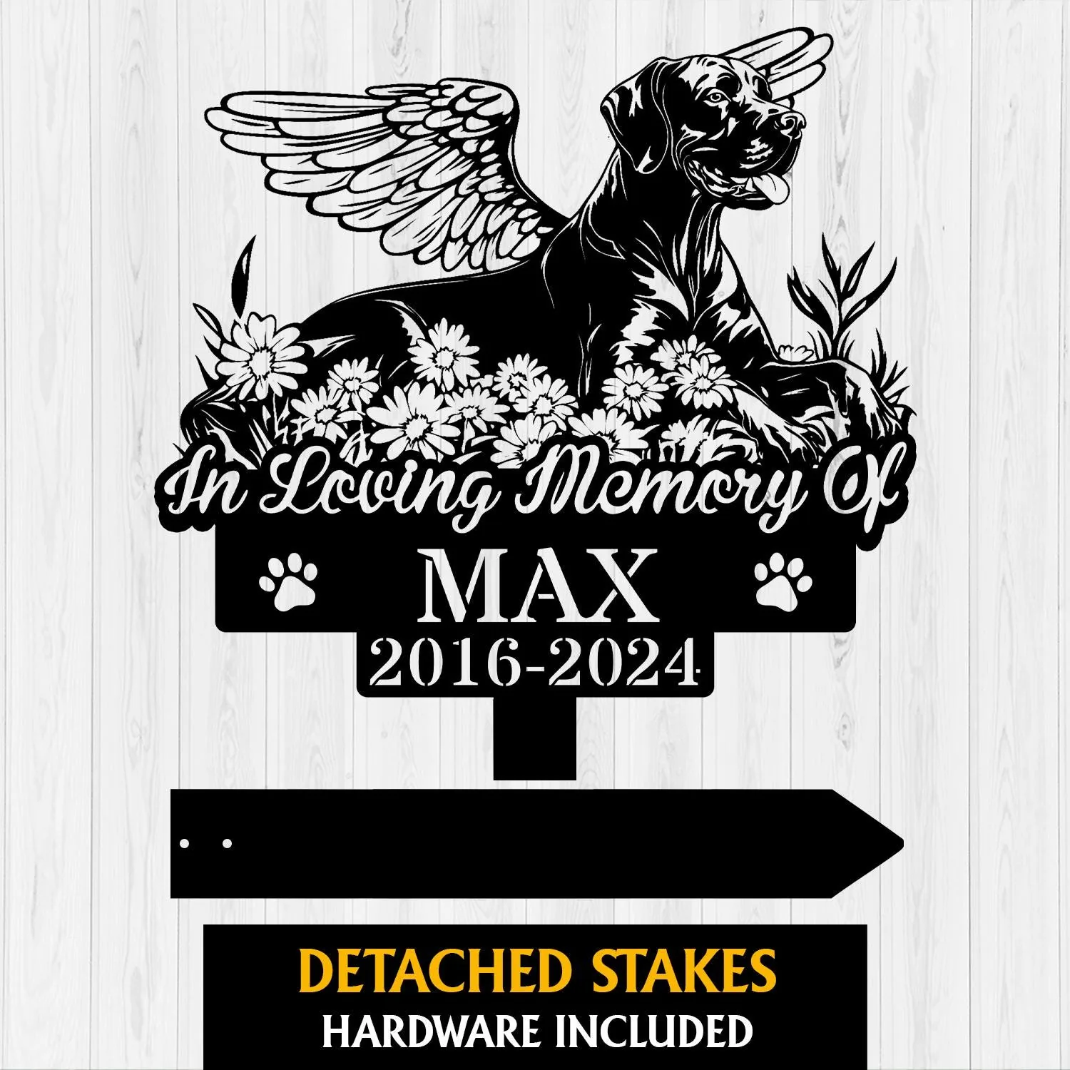 Black silhouette memorial sign with winged dog among flowers reading "In Loving Memory Of" and name MAX with dates 2016-2024, paw prints on wood background