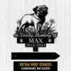 Pug-3 Black metal memorial sign with a pug illustration, flowers, paw prints and text “In Loving Memory Of MAX 2016-2024” on a light wood background