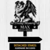 Shetland-Sheepdog-3 Black metal memorial sign showing a winged dog illustration with text "In Loving Memory Of" above name "MAX" and dates "2016-2024" on a light wood background