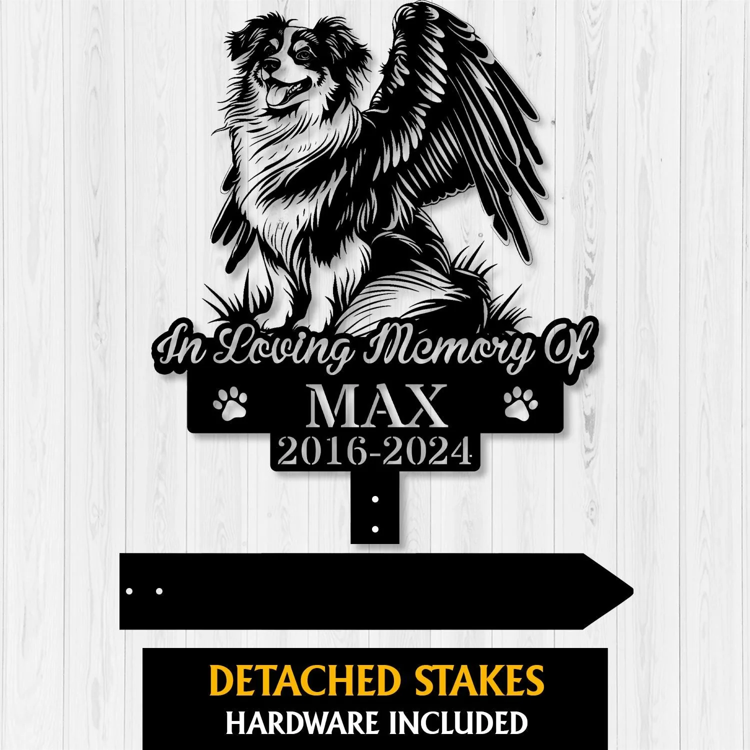 Shetland-Sheepdog-3 Black metal memorial sign showing a winged dog illustration with text "In Loving Memory Of" above name "MAX" and dates "2016-2024" on a light wood background