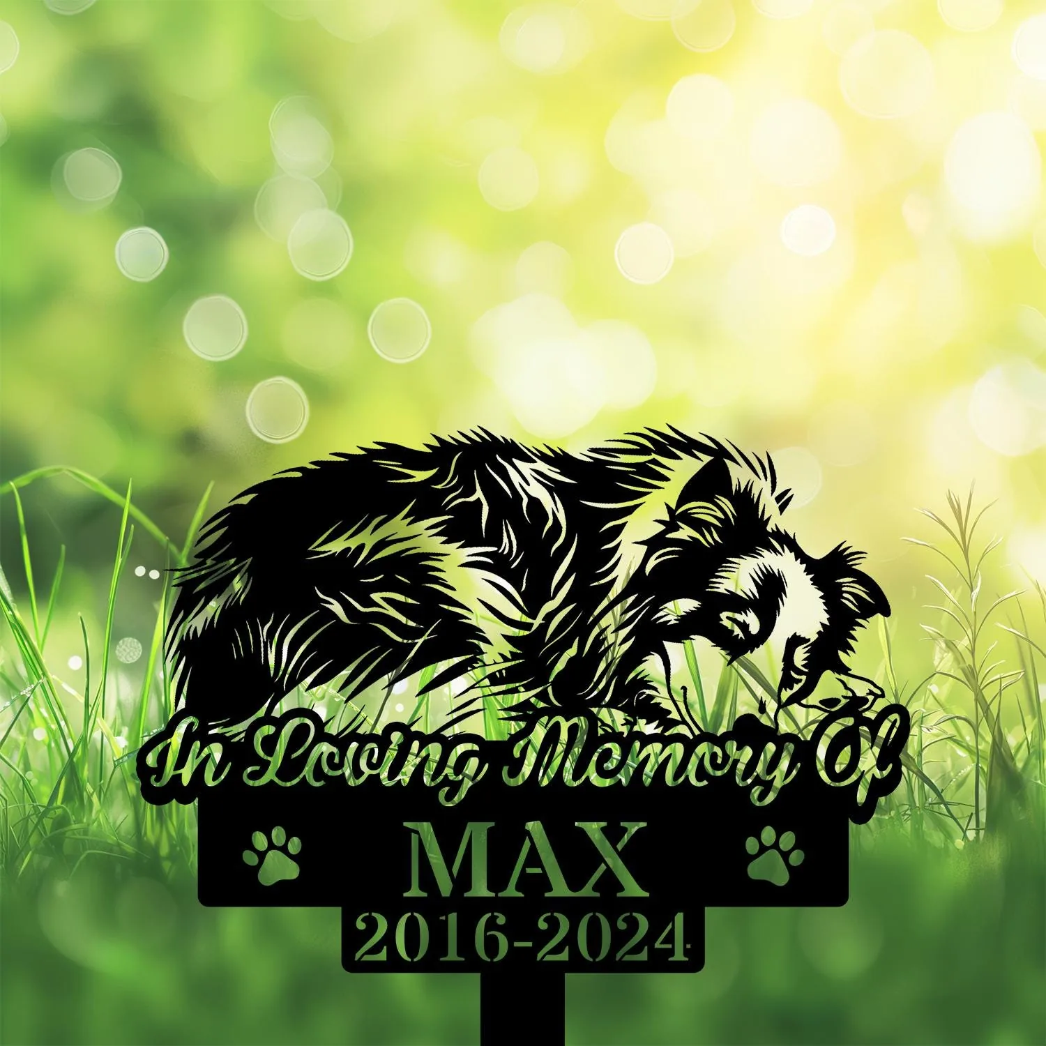 Shetland-Sheepdog-7 Black silhouette memorial sign of a dog sniffing the ground with text "In Loving Memory Of" and "MAX 2016-2024" against a bright green bokeh grass background