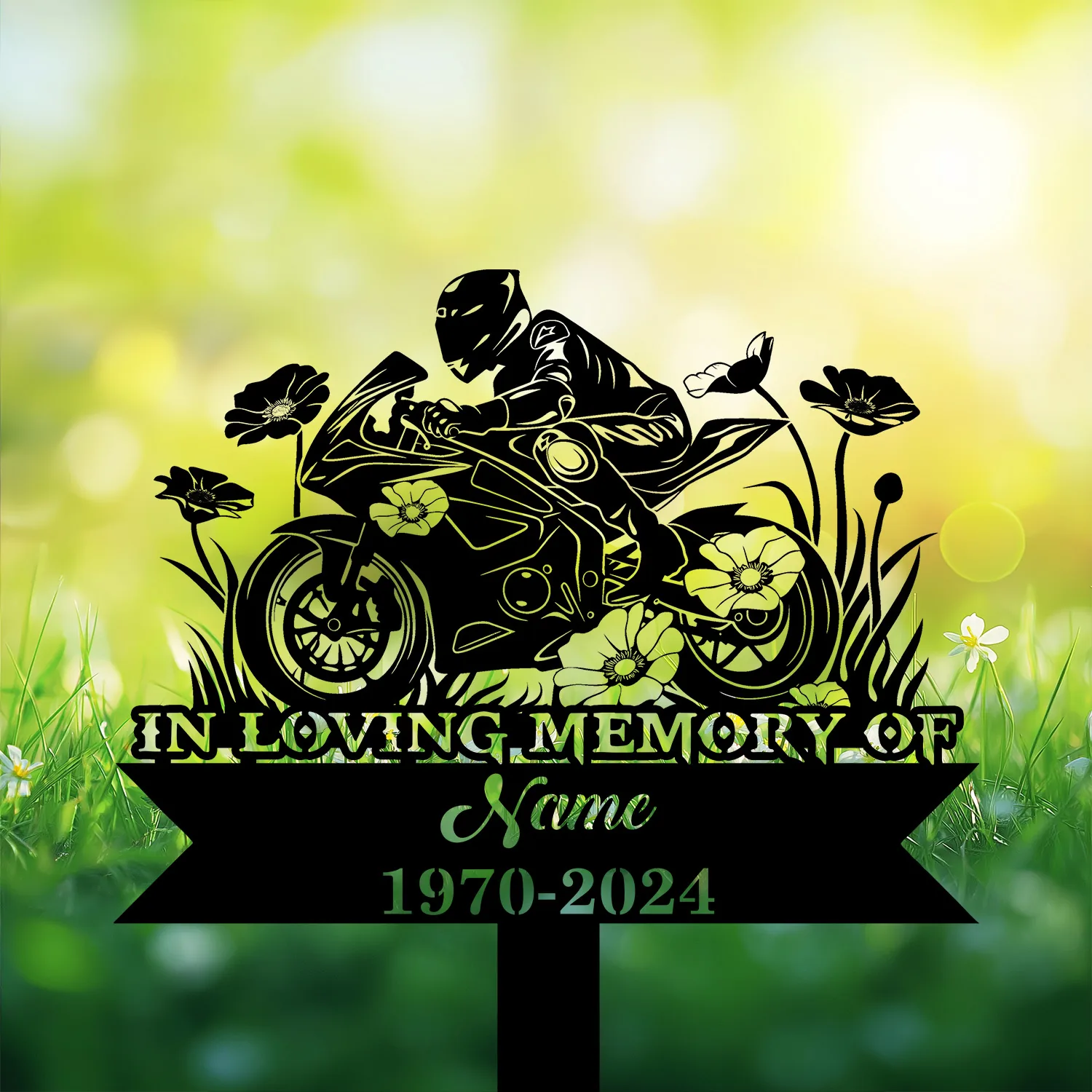 Black silhouette memorial garden stake showing a motorcyclist on a sportbike among poppy flowers with ribbon reading 'In Loving Memory' and dates 1970-2024
