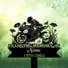 Black silhouette memorial sign of a motorcyclist on sport bike with flowers, text reading "IN LOVING MEMORY OF" and placeholder name and dates 1970-2024 on green grassy background