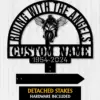 Sport-Biker-Riding-with-Angels-2 Black metal memorial sign with arched text “RIDING WITH THE ANGELS”, winged motorcyclist graphic, placeholder “CUSTOM NAME” and dates “1954-2024” on light wood background