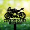 Sportbike-1 Black silhouette of a sport motorcycle on a decorative stake reading "CUSTOM NAME" with years "1960-2023" against a sunlit grassy background