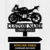 Sportbike-2 Black metal sign of a sport motorcycle silhouette above text reading “CUSTOM NAME” and years “1960-2023” on a light wood background, with detachable stakes shown below.