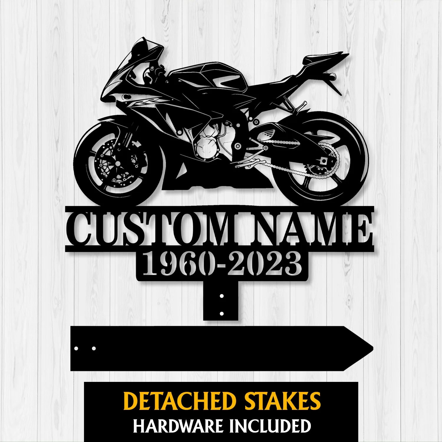 Sportbike-2 Black metal sign of a sport motorcycle silhouette above text reading “CUSTOM NAME” and years “1960-2023” on a light wood background, with detachable stakes shown below.