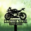 Sportbike-3 Black silhouette of a sport motorcycle on a garden stake with placeholder text "CUSTOM NAME" and dates "1960-2023" against a green blurred grass and leaf background
