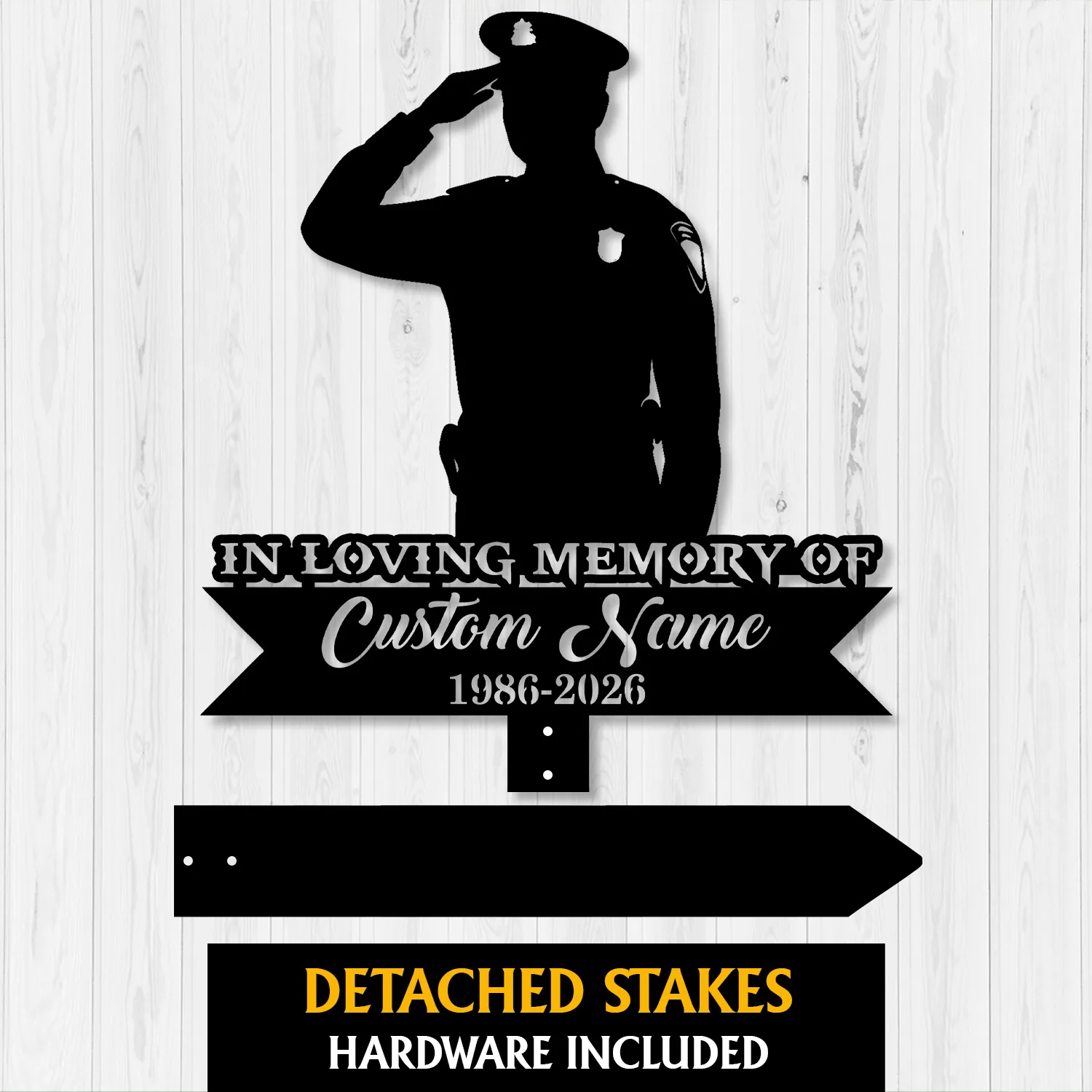 Black silhouette of a saluting police officer memorial sign reading "In Loving Memory of Custom Name 1986-2026" on a light wood background, detached stakes shown