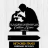 Style-14-Scientist-2 Black silhouette metal memorial sign of a scientist looking into a microscope reading “In Loving Memory of Custom Name 1986-2026” on a light wood background