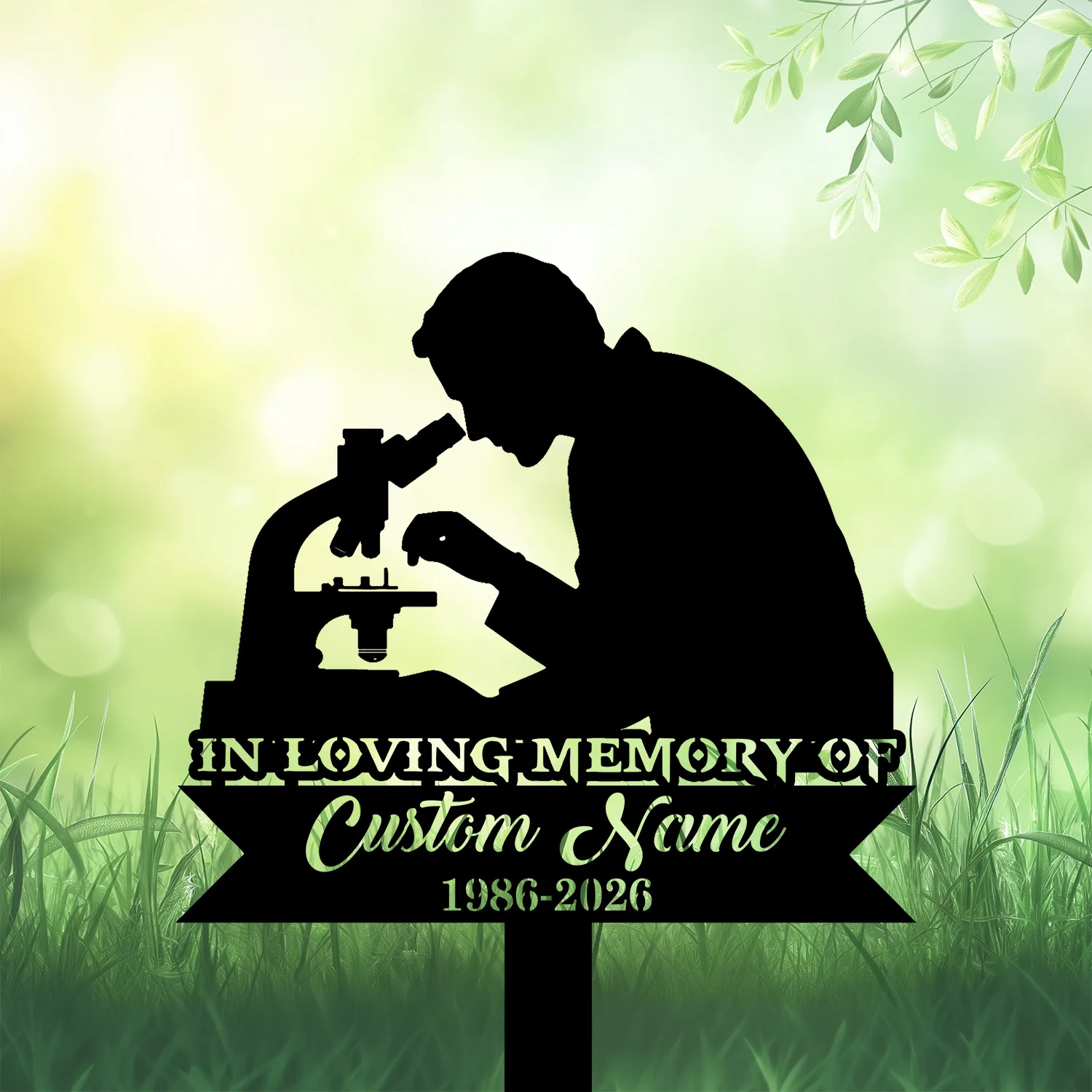 Style-14-Scientist-3 Black silhouette of a scientist looking into a microscope with memorial text reading "IN LOVING MEMORY OF Custom Name 1986-2026" on a green grassy background