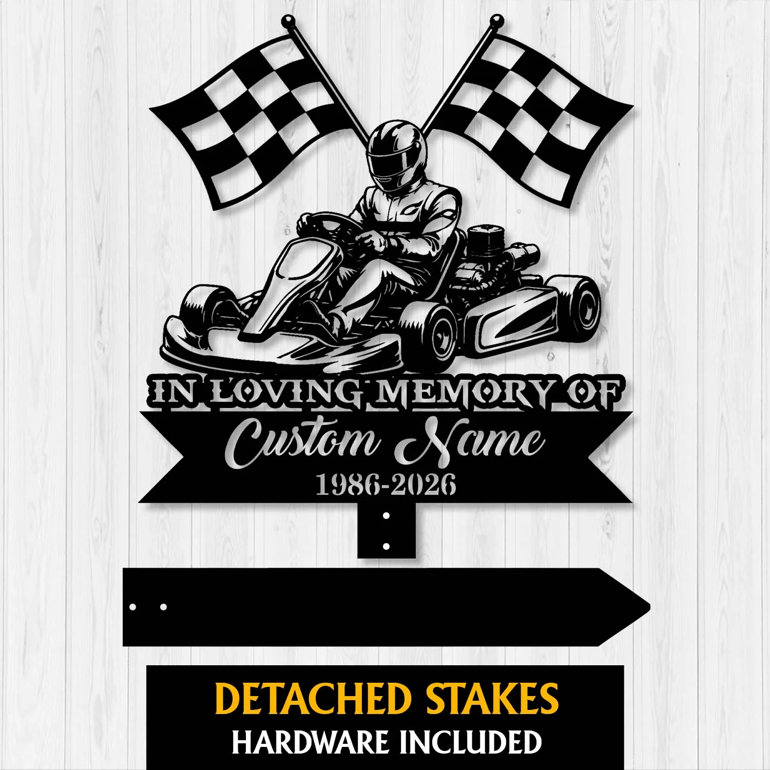 Black metal memorial sign mockup showing a go-kart driver with crossed checkered flags and text reading "In Loving Memory of Custom Name 1986-2026" on a light wood background