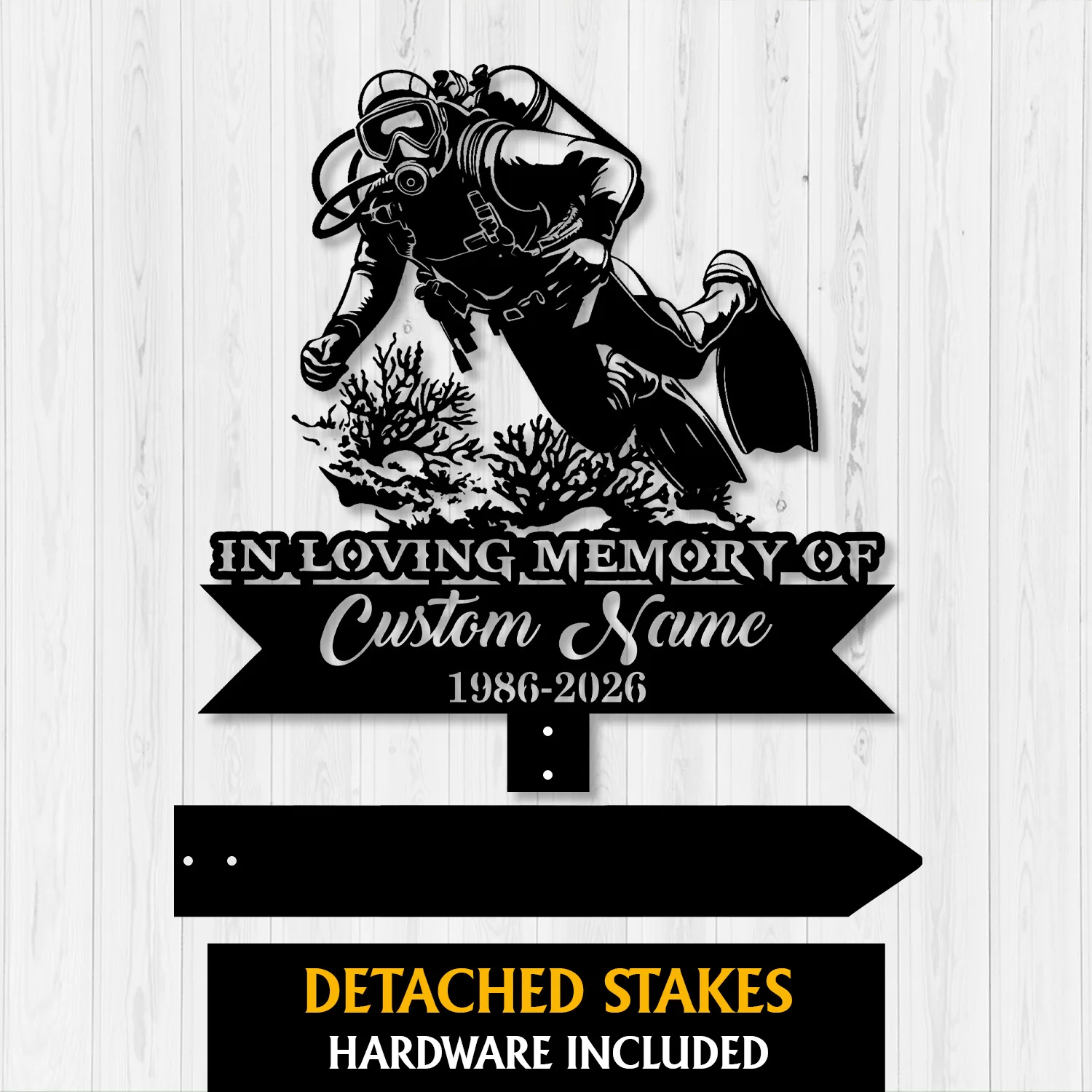 Style-15-Scuba-Diver-2 Black metal memorial sign showing a scuba diver over coral with text "In Loving Memory of" and customizable name and years, shown on a light wood background