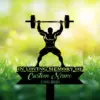 Black silhouette of a weightlifter holding a barbell above his head over a memorial sign reading "In Loving Memory" and customizable name and dates, set against sunlit grassy background