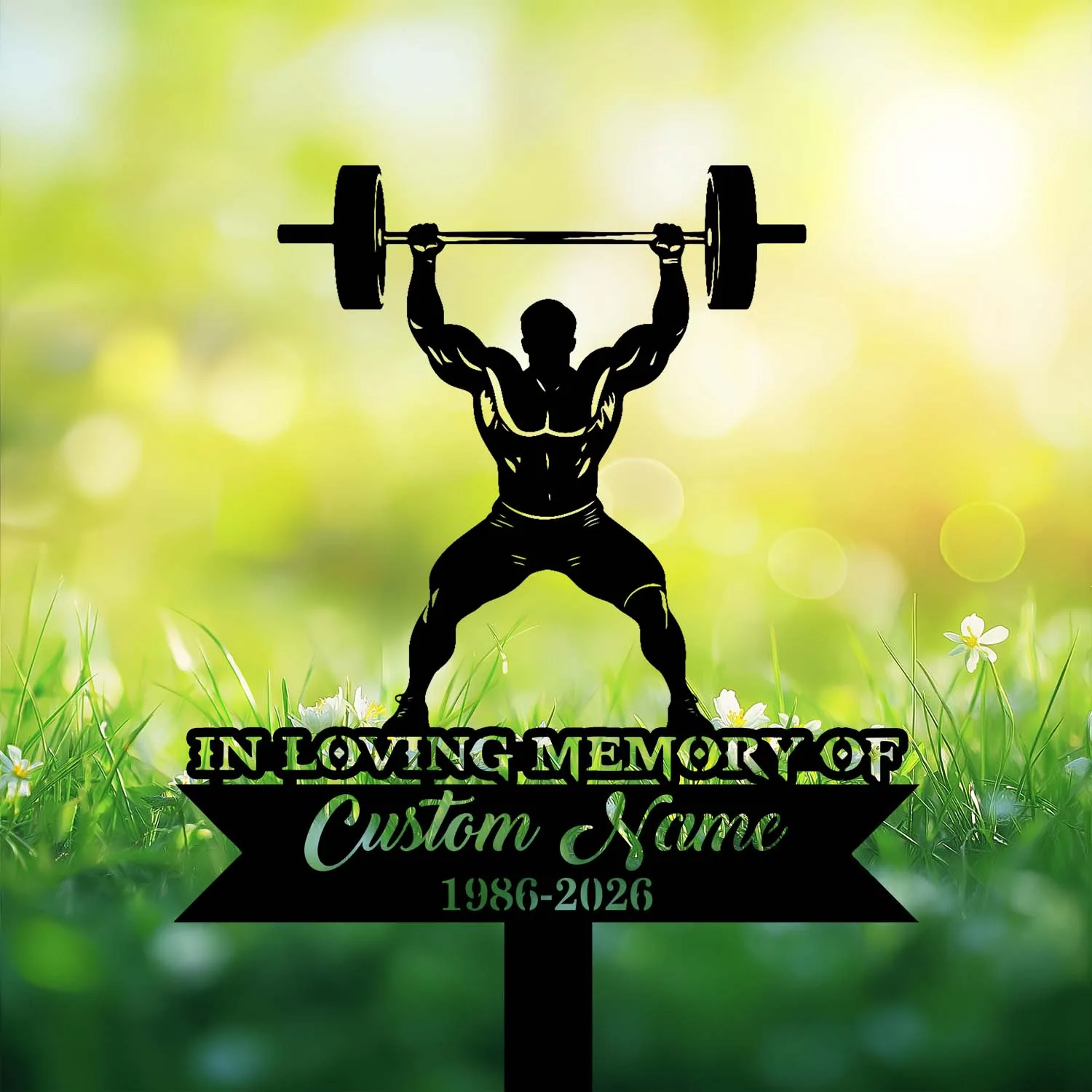 Black silhouette of a weightlifter holding a barbell above his head over a memorial sign reading "In Loving Memory" and customizable name and dates, set against sunlit grassy background