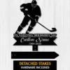 Black silhouette hockey player lawn memorial sign reading "In Loving Memory of Custom Name 1986-2026" with detached stakes on light wood background