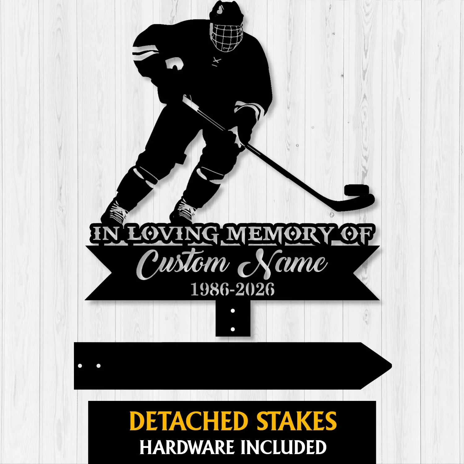 Black silhouette hockey player lawn memorial sign reading "In Loving Memory of Custom Name 1986-2026" with detached stakes on light wood background