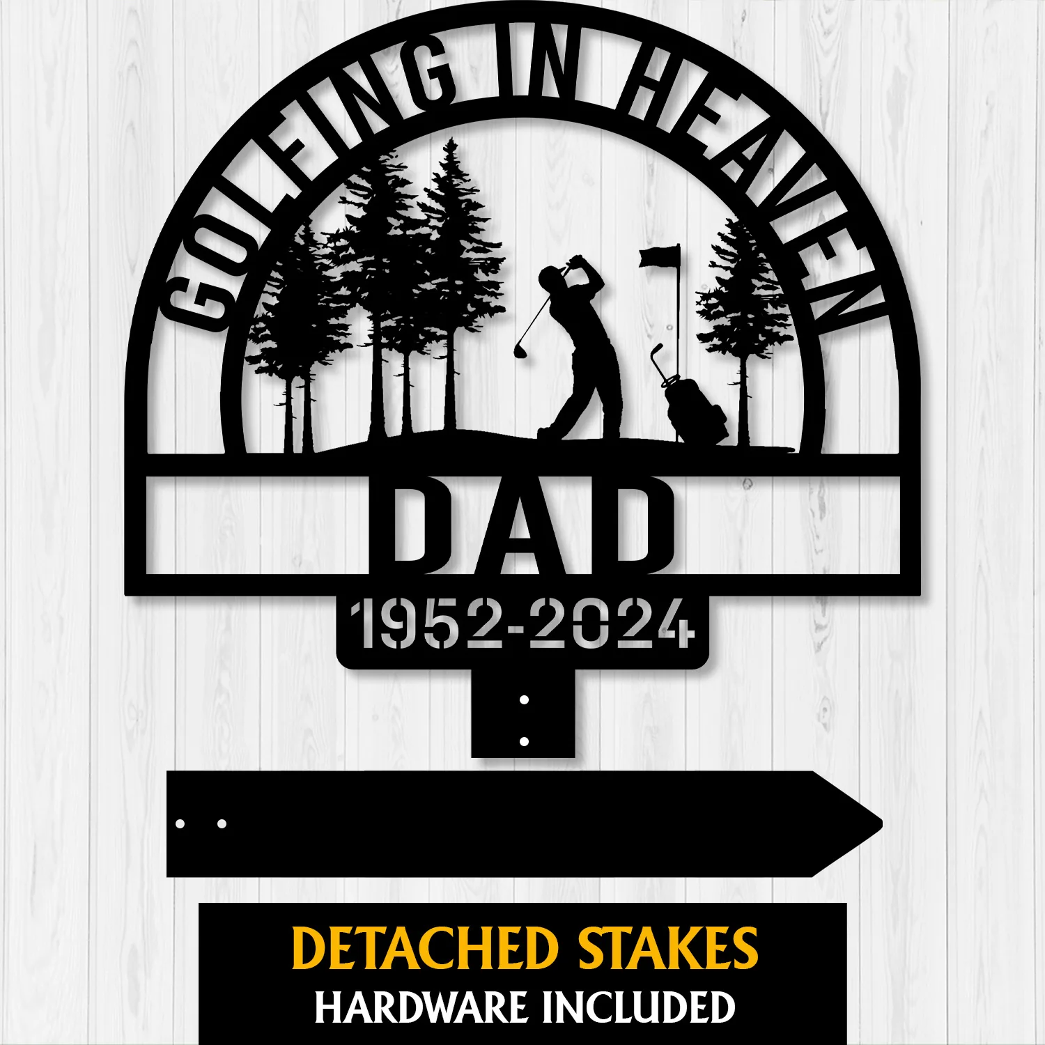 Black metal memorial sign with golfer silhouette, trees, the word DAD and dates 1952-2024 on a light wood background