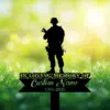 Silhouette of a soldier grave marker reading "In Loving Memory of" with "Custom Name" and dates 1986-2026 against a sunlit grassy background
