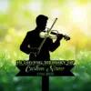 Style-22-Male-Violinist-1 Silhouette of a violinist above a black memorial banner reading "In Loving Memory of Custom Name 1986-2026" on a bright grassy, bokeh spring background