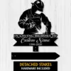 Black metal memorial yard sign showing a welder in helmet and apron with sparks, text 'IN LOVING MEMORY OF', 'Custom Name' and years '1986-2026' on a white wood background