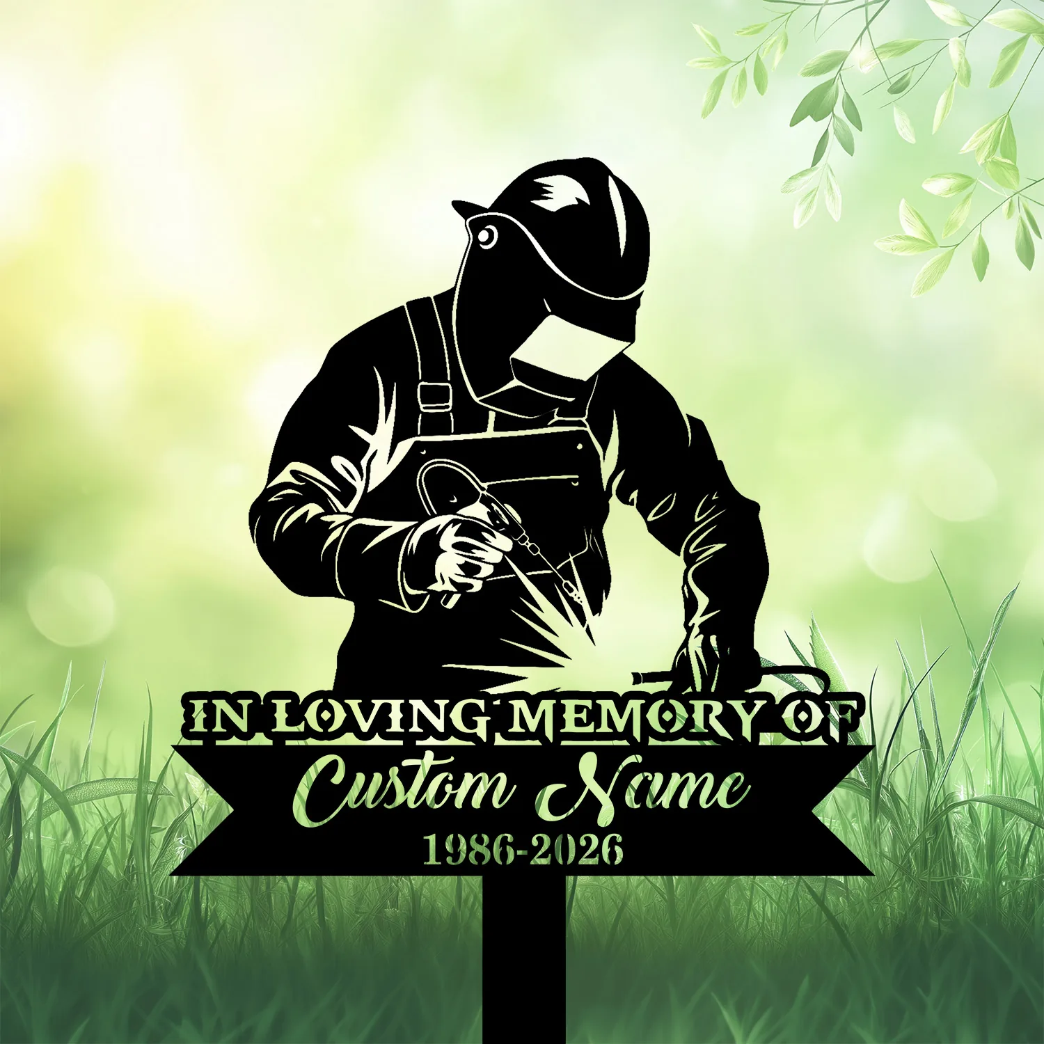 Black silhouette memorial sign of a welder in helmet and apron welding, over green blurred grass background with text placeholder 'In Loving Memory Custom Name 1986-2026'.