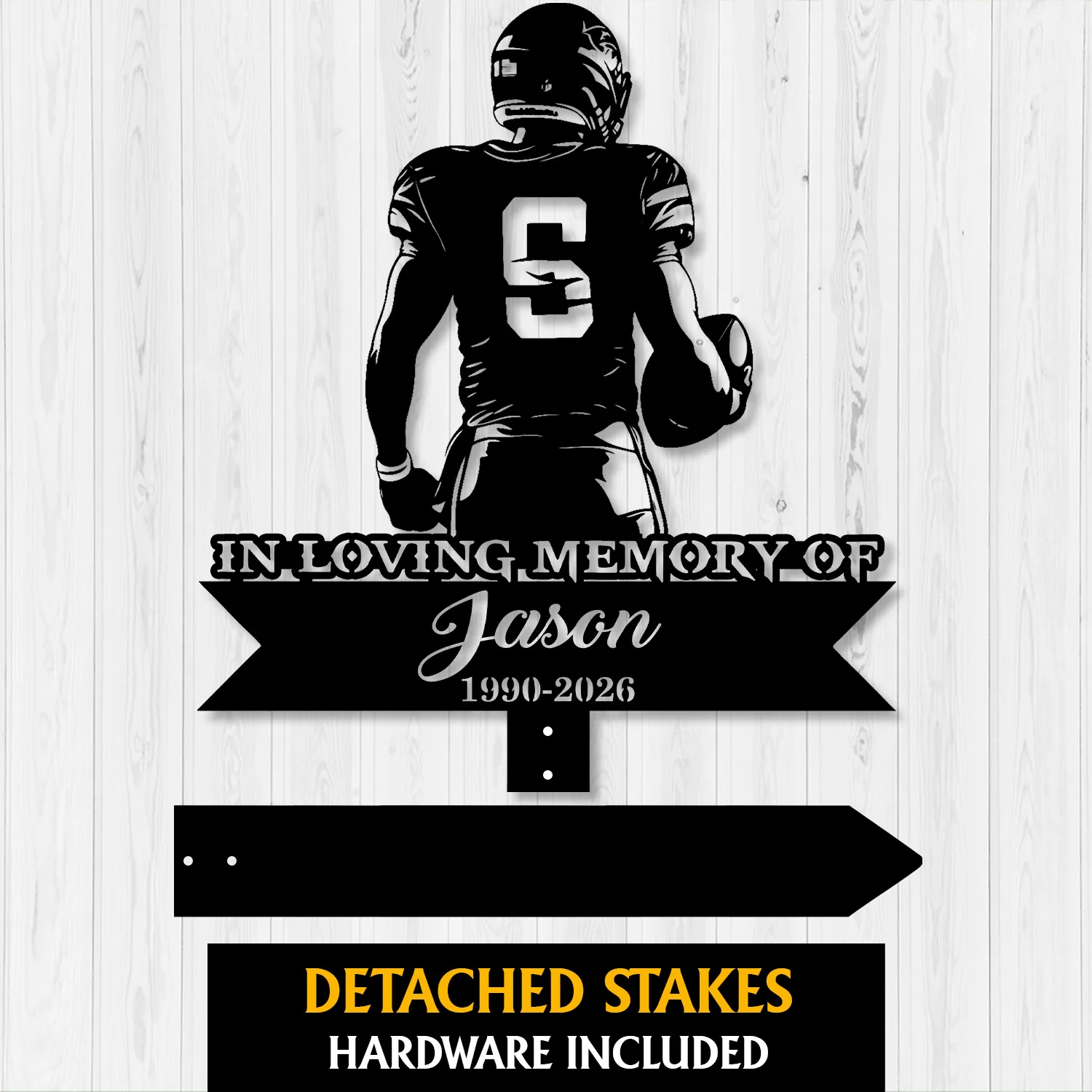 Black metal memorial yard sign silhouette of a football player wearing number 6 with text “In Loving Memory of Jason 1990-2026” on a light wood background