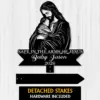 Style-24-Baby-with-Jesus-2 Black silhouette sign of Jesus holding a baby with text “Safe in the Arms of Jesus” and “Baby Jason 2026” on a light wood background