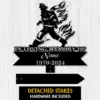 Black metal memorial sign silhouette of a firefighter with flames, text 'IN LOVING MEMORY OF', placeholder 'Name' and dates '1970-2024' on a light wood background