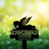 Silhouette memorial sign of a winged horse lying in grass reading "In Loving Memory Of" with customizable name and dates 2000-2024 against a bright green bokeh background