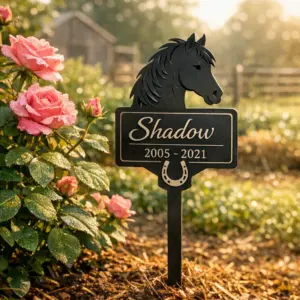 personalized metal horse memorial stake by a rose bed with engraved name and years