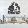 Black metal kitchen wall art silhouette of two chefs cooking with the words "CUSTOM NAME" above a bed on white shiplap wall in a modern farmhouse bedroom