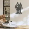 Modern living room with a metal wall art of a firefighter and partner standing side by side above a plaque reading "CUSTOM NAME"