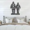 Black metal wall art of two firefighters holding hands with a 'CUSTOM NAME' plaque, mounted above a neutral farmhouse bedroom bed on white shiplap wall