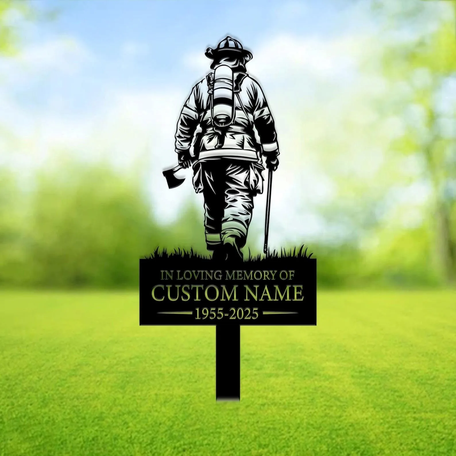 style-13.-Firefighter-Memorial-2 Silhouette memorial lawn sign showing a firefighter from behind holding an axe and tool, with text placeholder “In Loving Memory of CUSTOM NAME 1955-2025” against a grassy blurred background