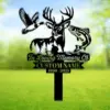 Black metal memorial yard sign with deer head, flying duck, leaping fish, forest silhouette and text "In Loving Memory Of" and placeholder "CUSTOM NAME 1950 - 2025" on green lawn