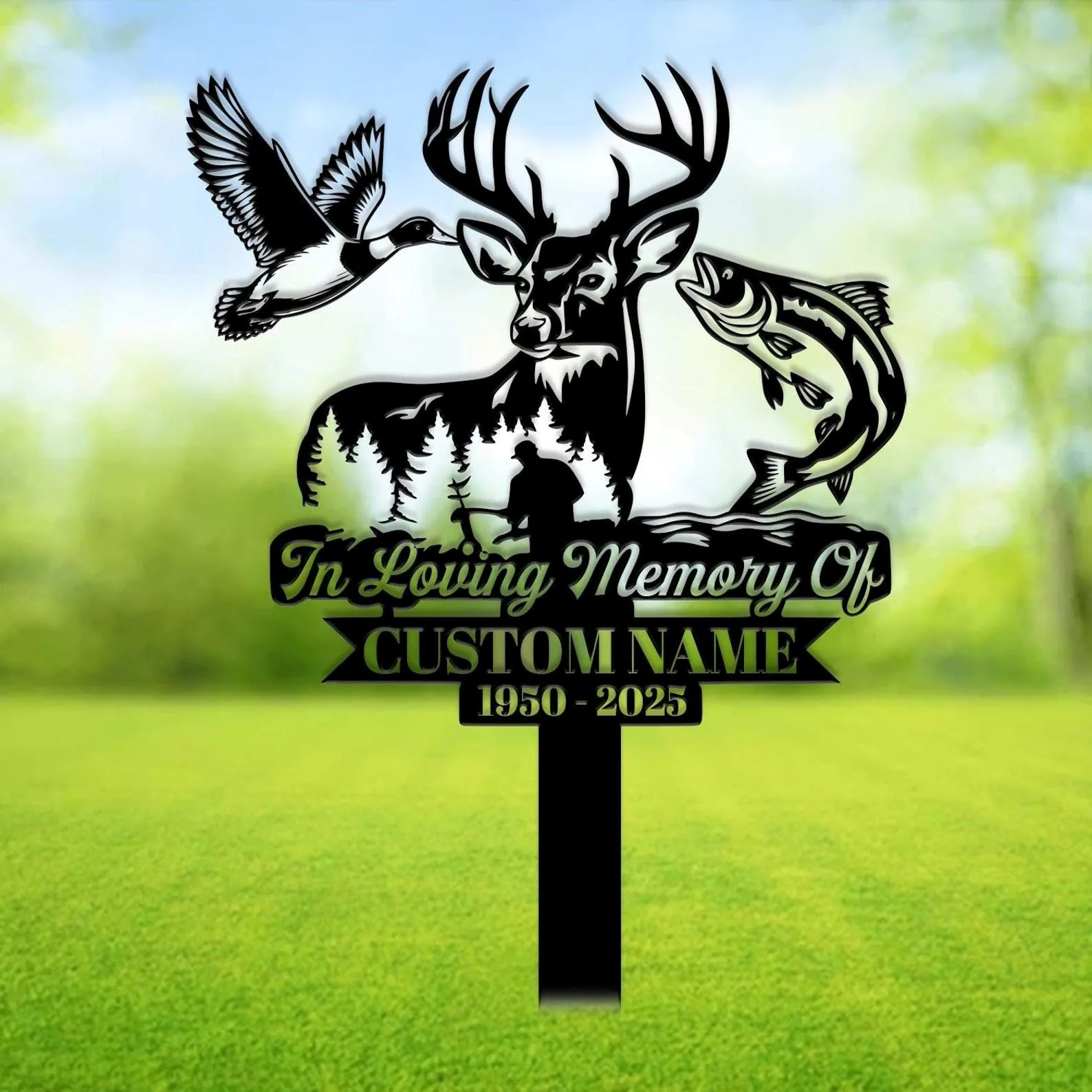 Black metal memorial yard sign with deer head, flying duck, leaping fish, forest silhouette and text "In Loving Memory Of" and placeholder "CUSTOM NAME 1950 - 2025" on green lawn