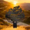 style-17.-Riding-in-Heaven-3 Black metal memorial silhouette of a motorcyclist with wings and trees reading "Riding in Heaven Russel Smith 1963 - 2025" against a golden sunset over winding mountain road