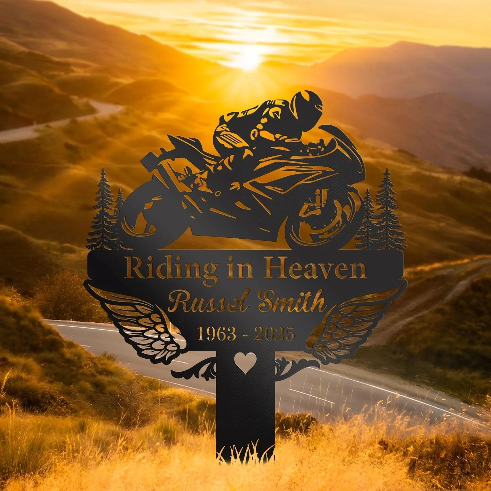 style-17.-Riding-in-Heaven-3 Black metal memorial silhouette of a motorcyclist with wings and trees reading "Riding in Heaven Russel Smith 1963 - 2025" against a golden sunset over winding mountain road