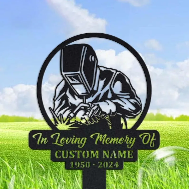 style-36.-Welder-Memorial-2 Metal memorial garden stake showing a welder with helmet and torch, text reading “In Loving Memory Of” and customizable name and dates 1950-2024