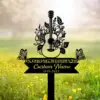 Black memorial sign in a grassy field featuring a floral acoustic guitar silhouette, butterflies and text reading "In Loving Memory" with placeholder "Custom Name 1955-2023"