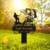 Black memorial yard sign showing a fisherman catching a large fish with text "In Loving Memory of Jacob Henderson 1956 - 2024" staked in sunny grassy yard
