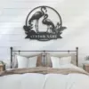 style-8.-Flamingo-Couple-2 Bedroom with metal flamingo wall art reading "CUSTOM NAME" mounted above a farmhouse bed with neutral pillows and shiplap wall