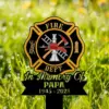 Fire Department memorial yard sign with Maltese cross, helmet, ladder and axe, text "In Memory Of PAPA 1945 - 2025" on grassy background