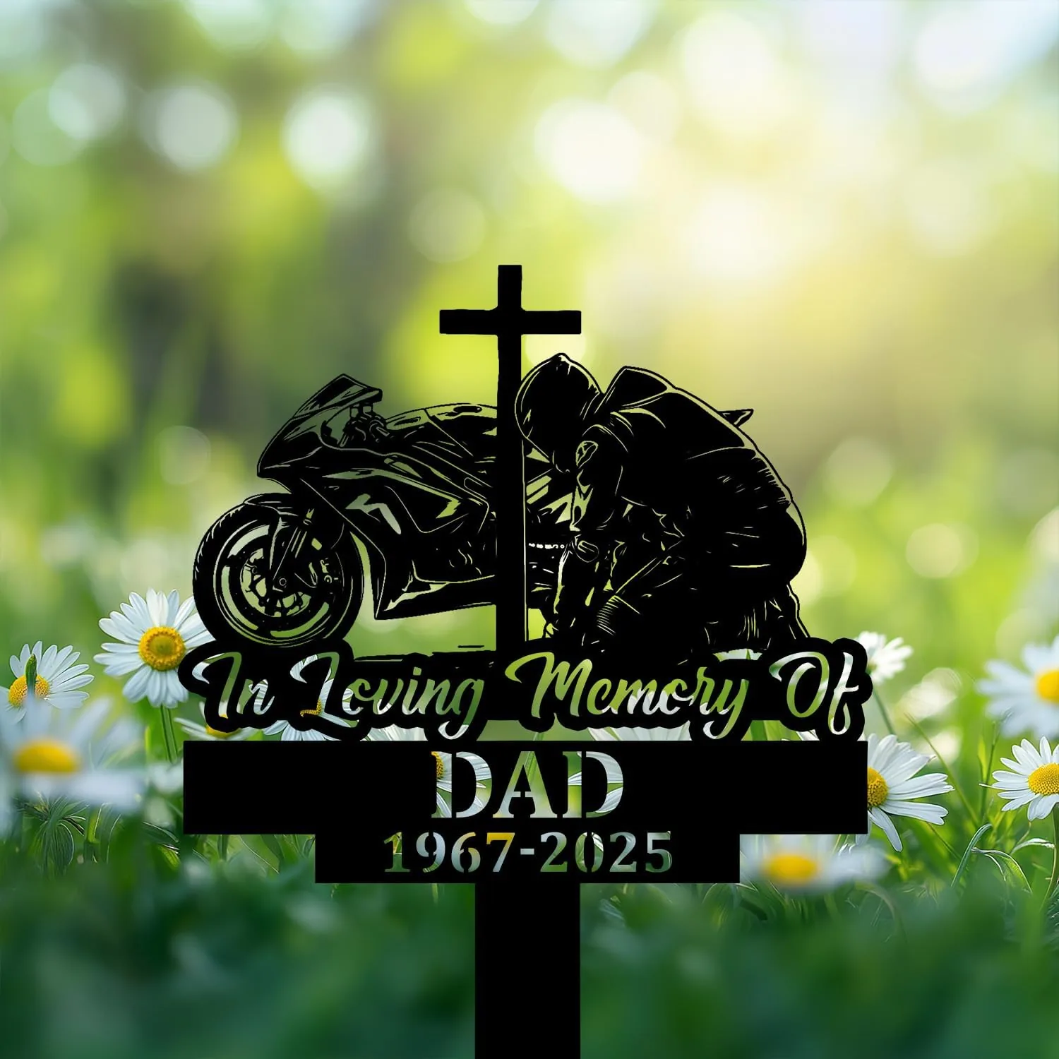 Black memorial silhouette of a motorcyclist kneeling by a cross and sportbike with text "In Loving Memory Of DAD 1967-2025" over a blurred daisy field background