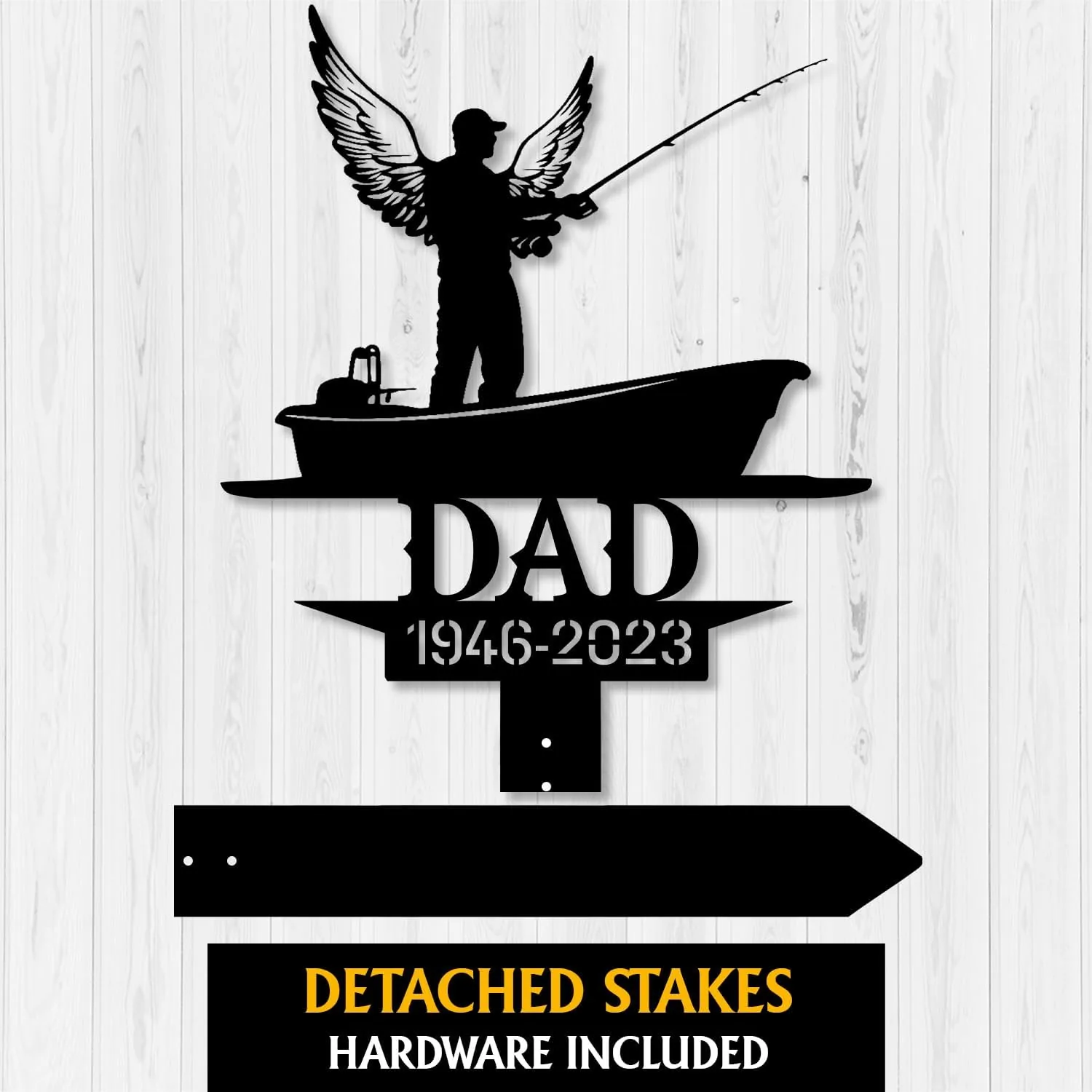 Black metal memorial sign silhouette of a man with angel wings fishing from a boat mounted on a white wood plank background, text reading DAD 1946-2023